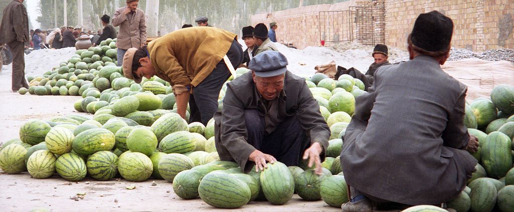 45 Kashgar Sunday Market 1993 Selling Melons